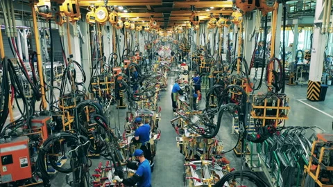 Several car factory workers welding car parts at a car manufacturing facility Video stock 144545800