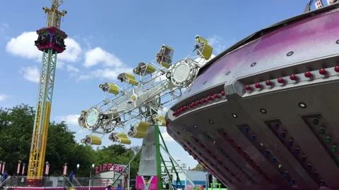 Several carnival rides in motion Video stock 155136748