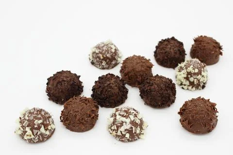 Several chocolates on white background Stock Photos