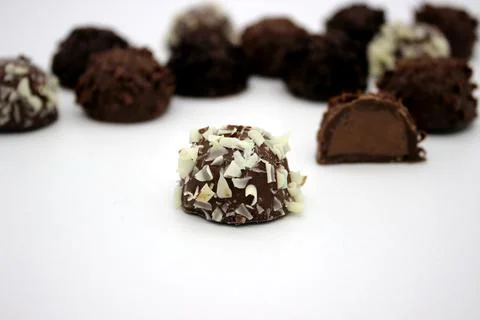 Several chocolates on white background Stock Photos