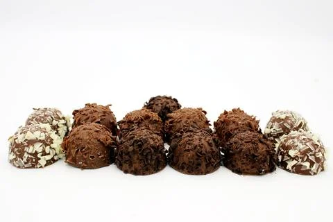 Several chocolates on white background Stock Photos