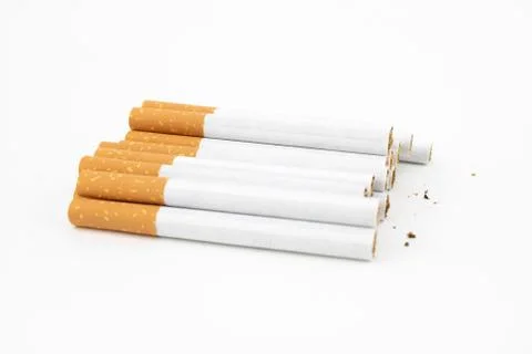 Several cigars on white background. Filtered cigarettes. Tobacco. Stock Photos