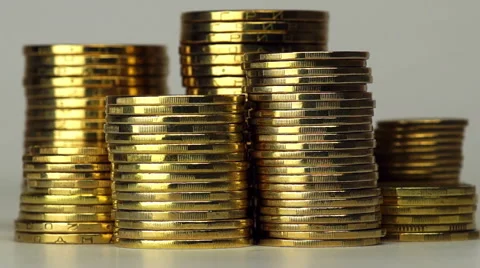 Several Columns of Coins Spinning 스톡 동영상 46325579