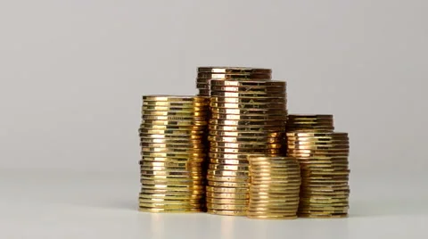 Several Columns of Coins Spinning Видео 47137268