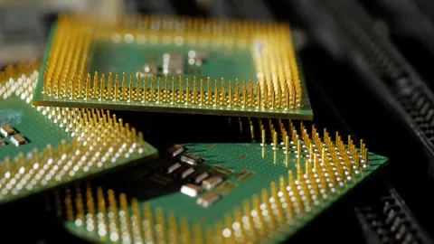 Several computer microprocessors lie on the motherboard close-up Stockbeeldmateriaal 283442791