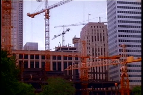 Several construction cranes timelapse moves downtown Video stock 183583654