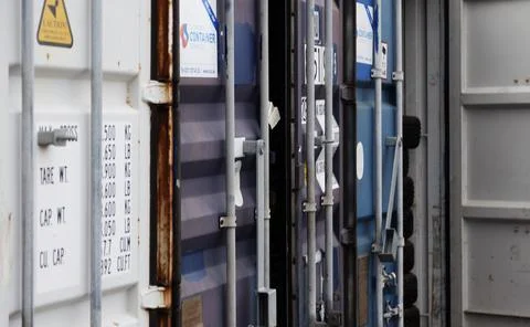 Several containers in a row with hatches Stock Photos