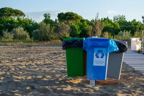Several containers for selective waste collection on the beach Foto stock
