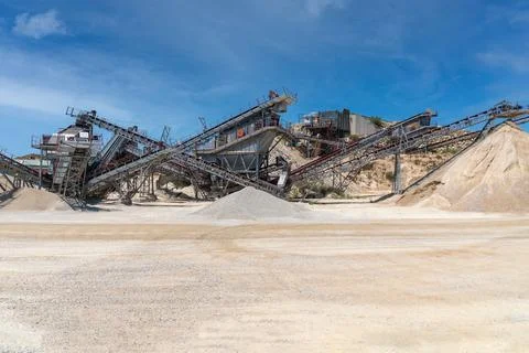 Several conveyor belts in a quarry for the classification of gravel,Arid quar Stock Photos