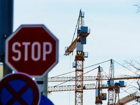 Several cranes on construction site Stock Photos