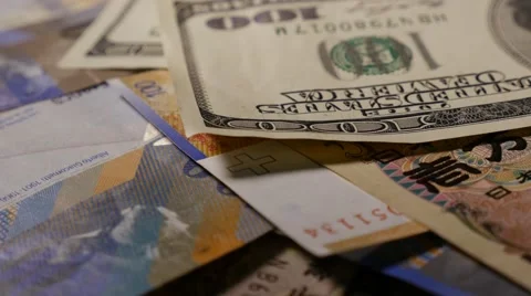 Several currencies turning Stock Footage