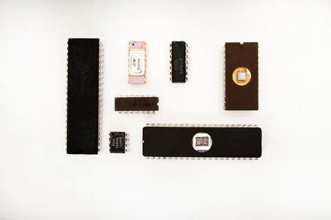 Several different chips on a white background. Old electronic chips. 写真素材