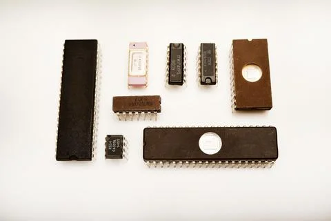 Several different chips on a white background. Old electronic chips. 写真素材
