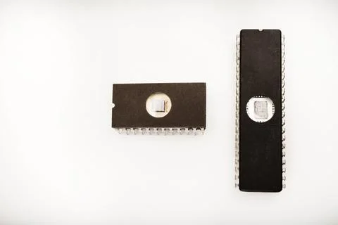 Several different chips on a white background. Old electronic chips. 写真素材