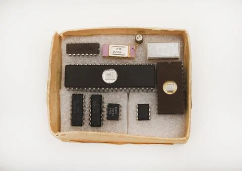 Several different chips on a white background. Old electronic chips. 写真素材