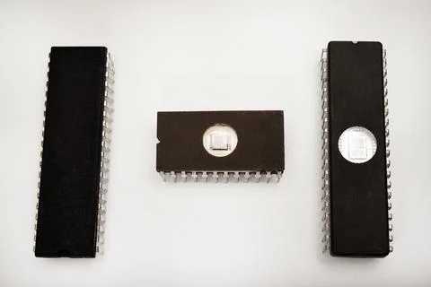 Several different chips on a white background. Old electronic chips. 写真素材