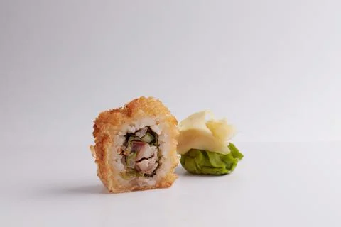 Several different rolls on the table, Asian food, side view, light background Stock Photos
