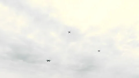 Several Drones flying in Airspace and searching for Enemy Positions. Military Stock Footage 247837892