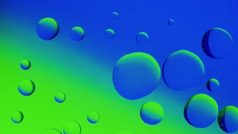 Several drops join together on a blue-green gradient background. 動画素材 303059564