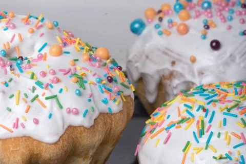Several Easter cakes with white icing and decorations Stock Photos