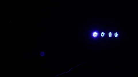 Several electric searchlights in the dark Stock Footage 84547734