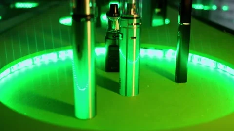Several electronic cigarettes are on showcase during exhibition Stock Footage 276374943