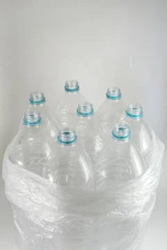 Several empty bottles of liter and a half mineral water, without caps, just w Stock Photos