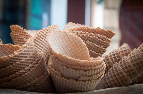 Several empty fresh wafer ice cream cone cornet cups . Stock Photos