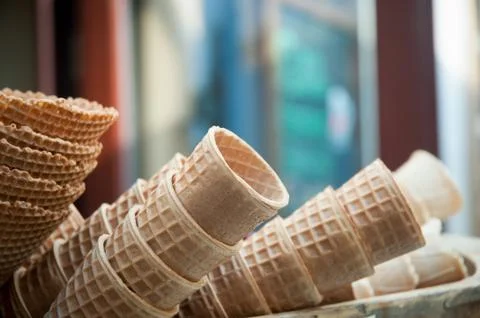 Several empty fresh wafer ice cream cone cornet cups . Stock Photos
