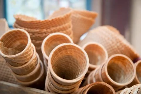 Several empty fresh wafer ice cream cone cornet cups . Stock Photos