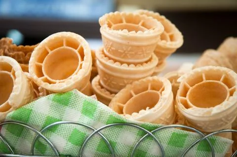 Several empty fresh wafer ice cream cone cornet cups . Stock Photos