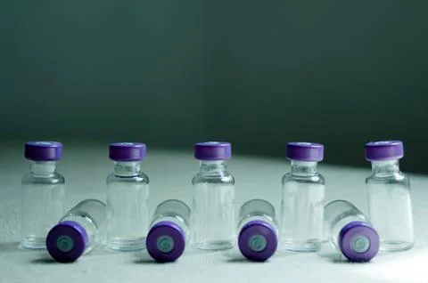 Several empty vials placed in line Stock Photos