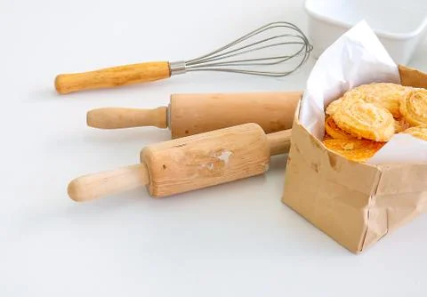 Several equipment or tools for bakery cooking including rolling pin, whisk Stock Photos