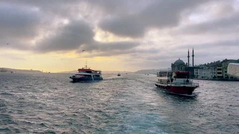 Several ferries in the Bosphorus against the backdrop of a beautiful dramatic Stock Footage 201154932