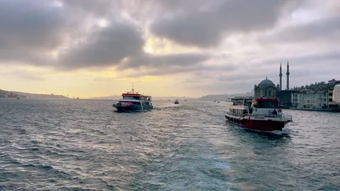 Several ferries in the Bosphorus against the backdrop of a beautiful dramatic Stock Footage 201890404
