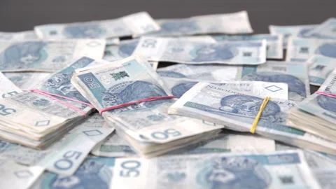 Several files of banknotes lie on the table. Scattered money on the table. Stock Footage 194775219
