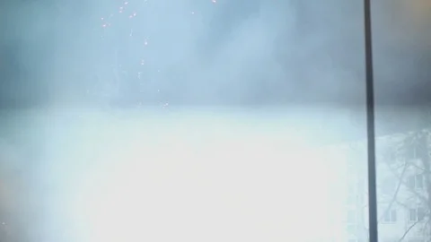Several fireworks explode on the street of the city and in the sky Stock Footage 130169867