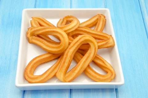 Several fried churros Foto stock