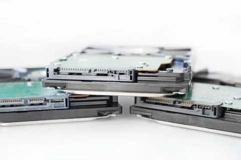 Several hard drives for a computer close-up on a light background Stock Photos