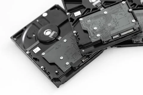 Several hard drives for computer systems are located on a light background,.. Foto stock