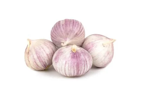 Several heads of garlic on a white background Stock Photos