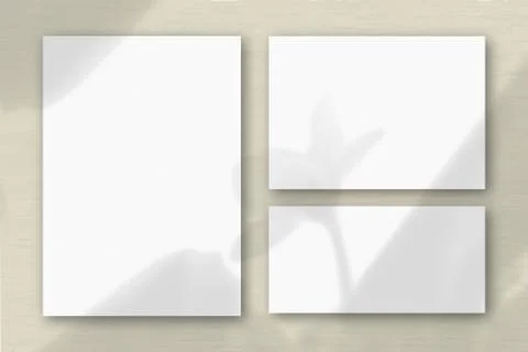 Several horizontal and vertical sheets of white textured paper on the backgro Stock Illustration