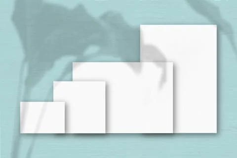 Several horizontal and vertical sheets of white textured paper against Stock Illustration