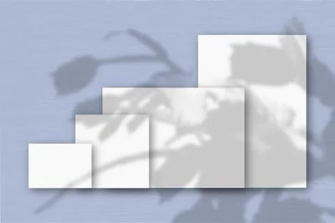 Several horizontal and vertical sheets of white textured paper against a blue Stock Illustration