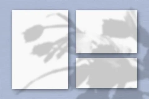 Several horizontal and vertical sheets of white textured paper on the backgro Stock Illustration