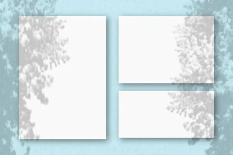 Several horizontal and vertical sheets of white textured paper on the backgro Stock Illustration