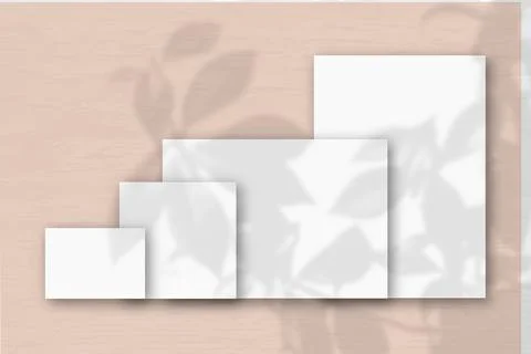 Several horizontal and vertical sheets of white textured paper against a pink Stock Illustration