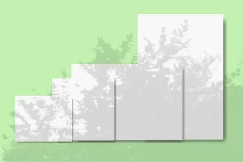 Several horizontal and vertical sheets of white textured paper against a green Stock Illustration