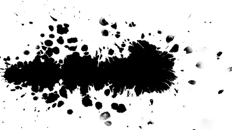 Several ink drops from right to left on wet paper 05 Stock Footage 70574895