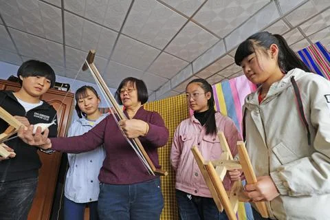 Several junior high school students during a visit to the indigenous weavin.. Stock Photos